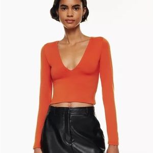 Orange Aritzia Babaton contour v-neck long sleeve